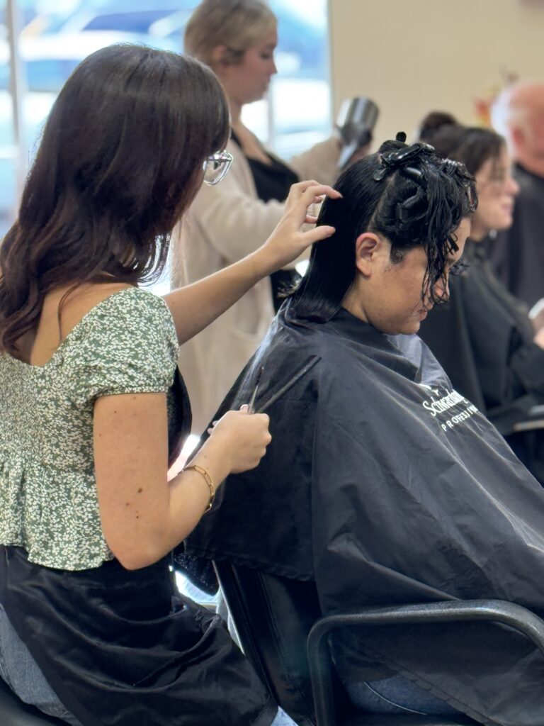 stylists collaborating on a color service at willow hair, eugene OR