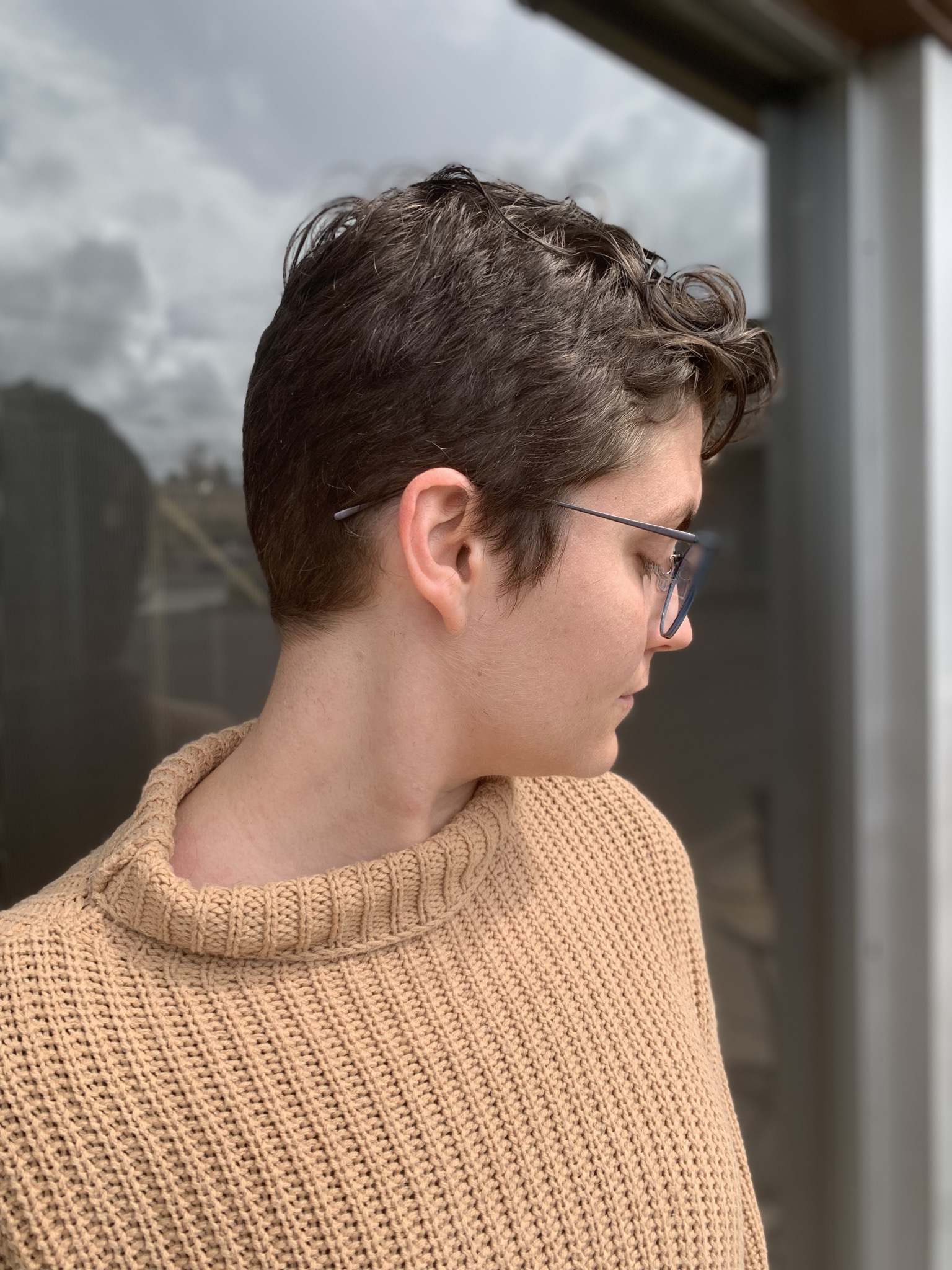 client with a short pixie cut by a stylist at willow hair, eugene OR